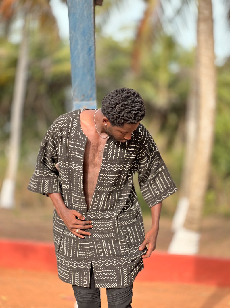 Bogolan Black Panthers cloak by fuzak Bogolan & Mudcloth fabrics ANKA