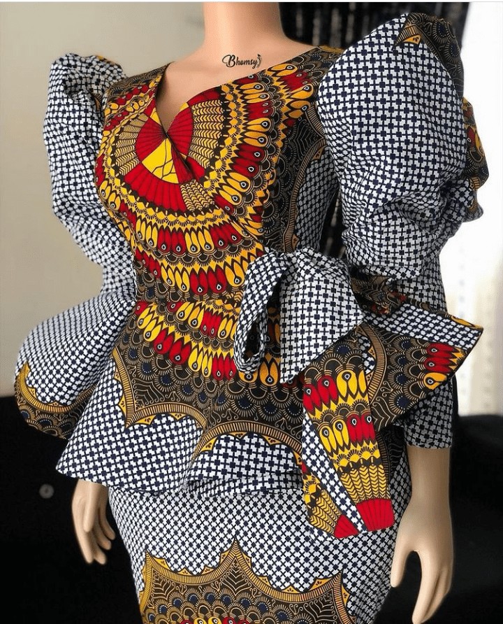 black collarless coat