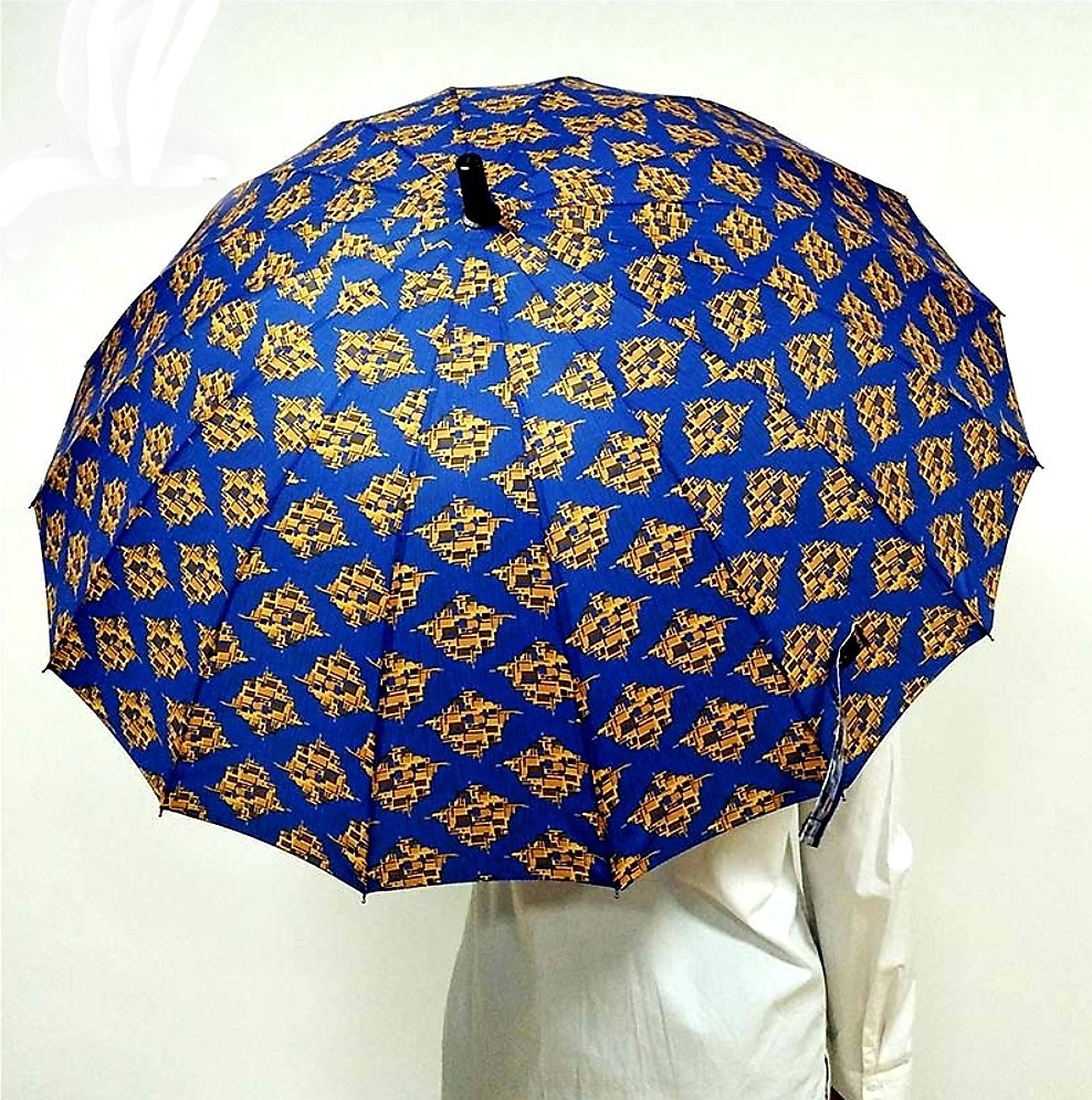 Wax print umbrella by notchedinafrica Umbrellas Afrikrea