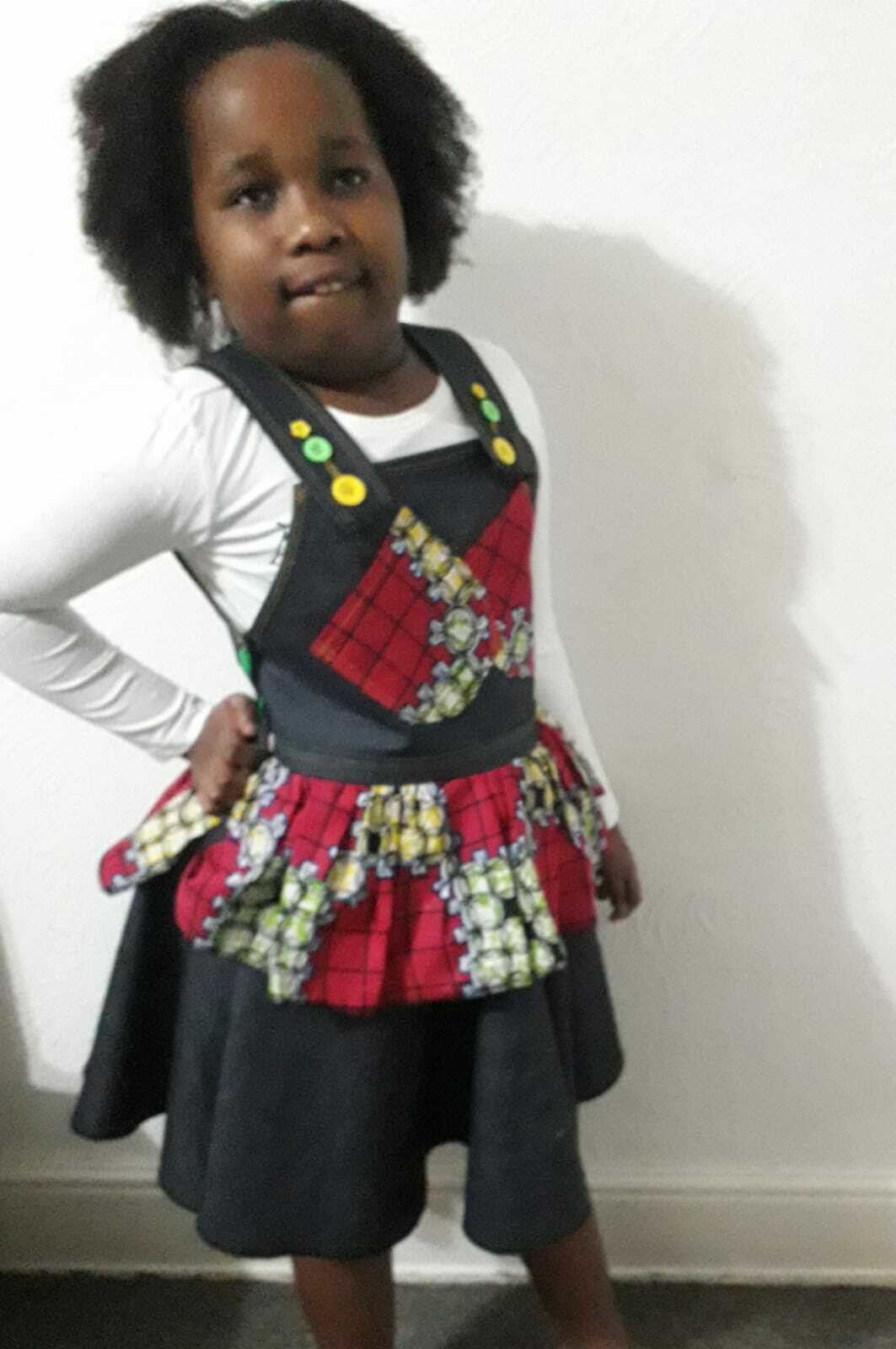 girls black dungaree dress