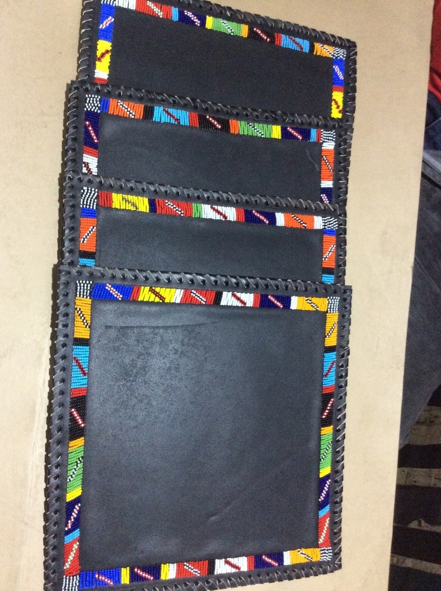 A set of 4 Maasai beaded 12inch by 12 inch leather table mats,African t
